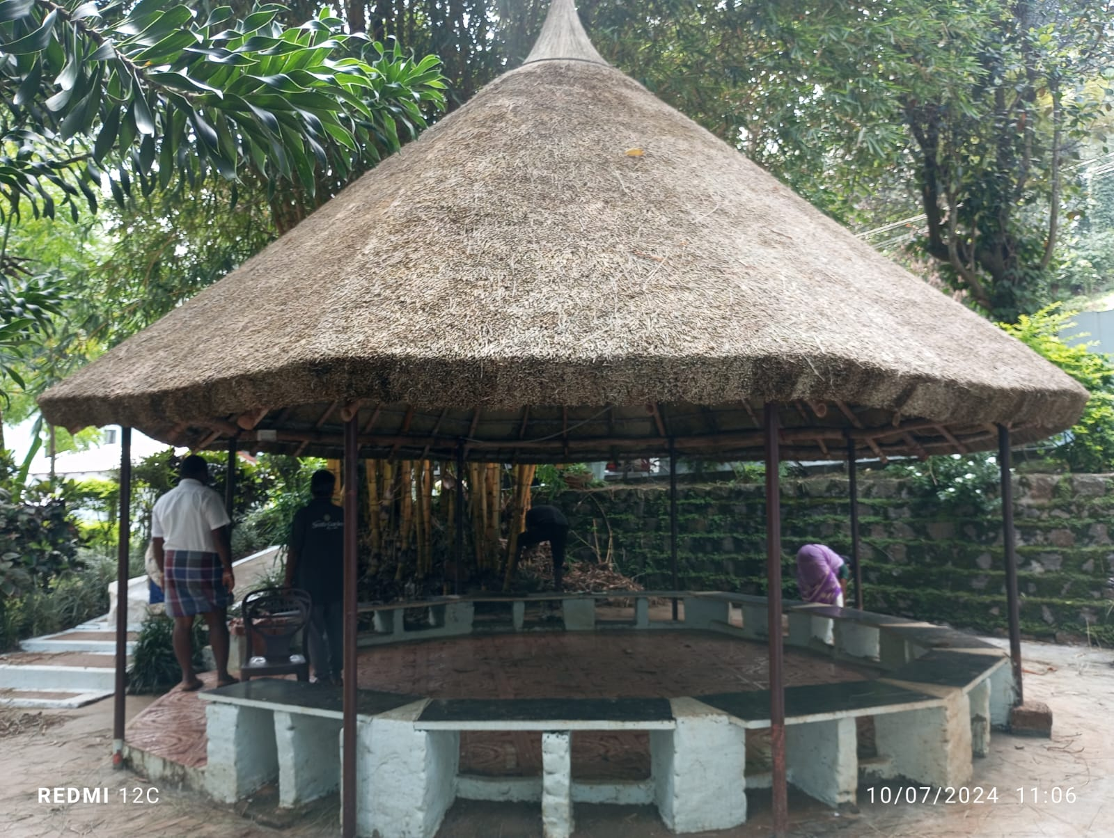 Traditional South Indian house with thatched roof and mud walls